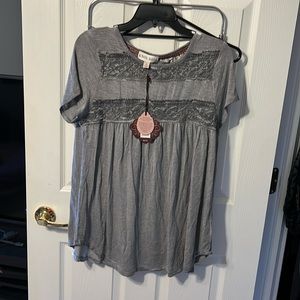 Women’s shirt with lace inlays